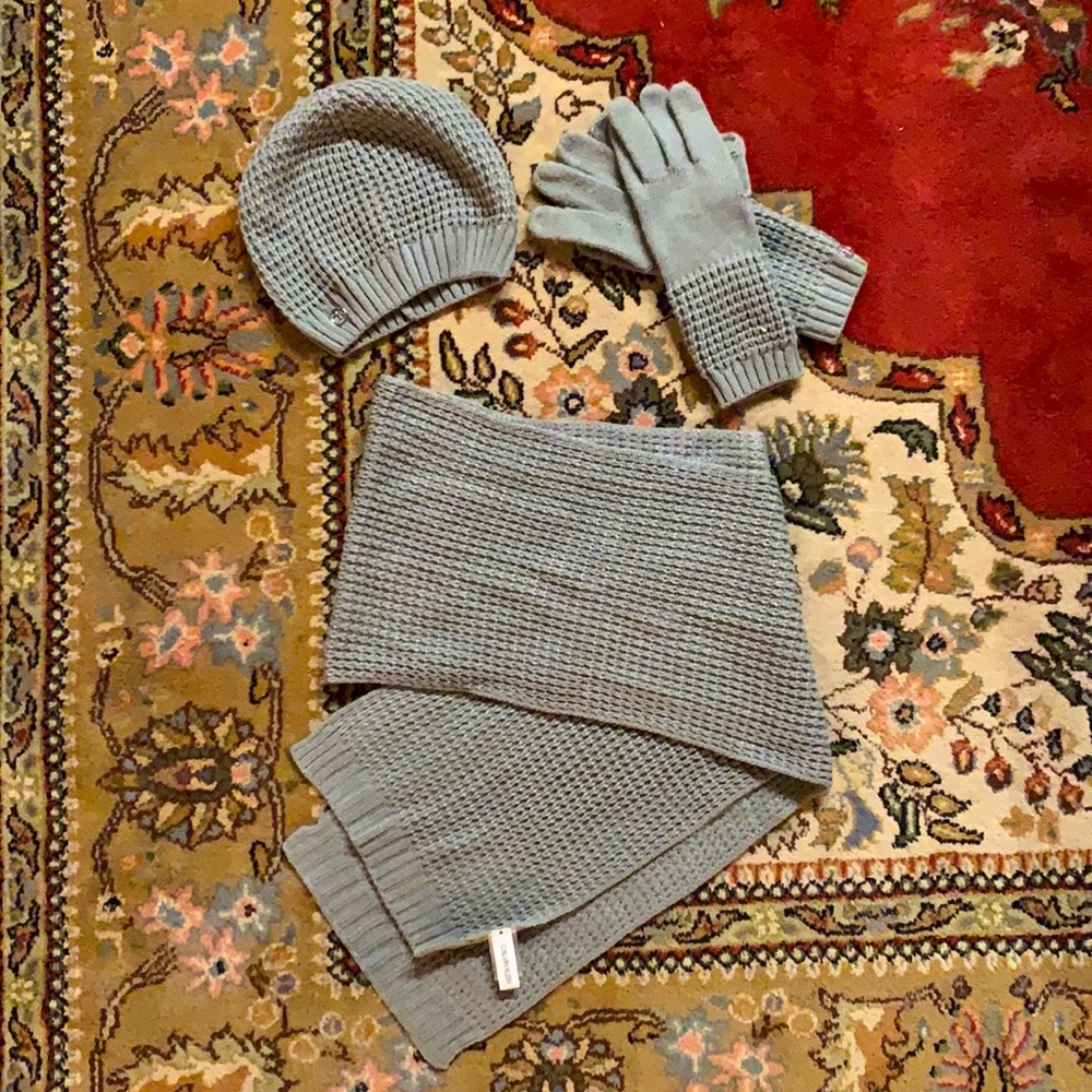 Calvin Klein matching scarf, gloves, and hat set.